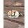 Kegyeleti dísz kőtálban, rózsával és krizantém virággal 